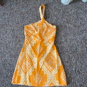 Crisscross neck orange and white patterned dress size small